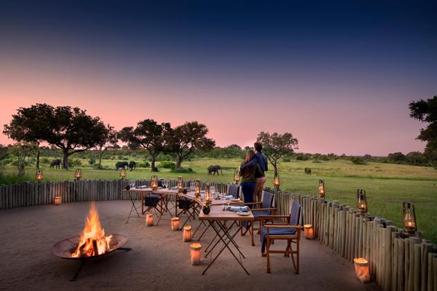 Cenando en Singita Castleton. © Singita